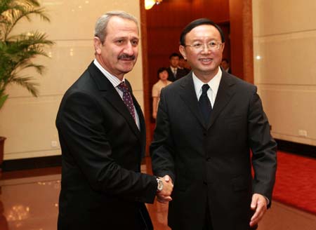 Chinese Foreign Minister Yang Jiechi (R) meets with visiting Turkish State Minister Zafer Caglayan who paid the visit to China as special envoy of Turkish Prime Minister Recep Tayyip Erdogan, in Beijing, capital of China, Aug. 30, 2009. (Xinhua/Pang Xinglei) 