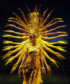 Dancers perform during a dress rehearsal for the Dunhuang dance show "Flying Apsars" in Taipei of southeast China's Taiwan, Dec. 12, 2009. The dance show will be staged on Dec. 12-13 in Taipei.