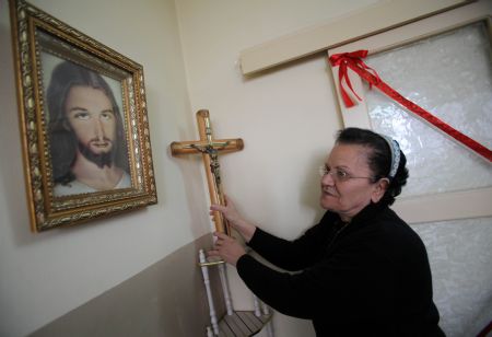 Soad al-Massri, 57-year-old Palestinian Christian, is seen at her house in Gaza city Dec. 22, 2009. Israel only allows Gaza Christians who are older than 35 years to travel to the West Bank city of Bethlehem to celebrate the Christmas. (Xinhua/Wissam Nassar)