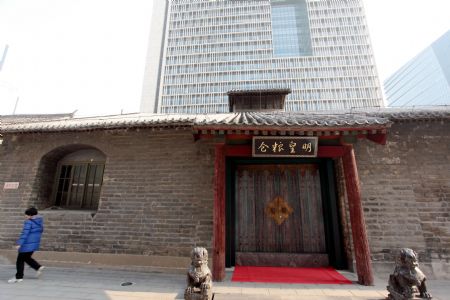 Photo taken on Jan. 16, 2010 shows the facade of the Imperial Granary Museum of Ming Dynasty of Nanxingcang Barn, which has been opened to public visitors, in downtown of Beijing. Affluent exhibits reenacting the history of grains transport through the Grand Canal and the imperial barns storage are accessible to visitors, who can also experience the quern of stone mill some 600 years ago. (Xinhua/Luo Wei)