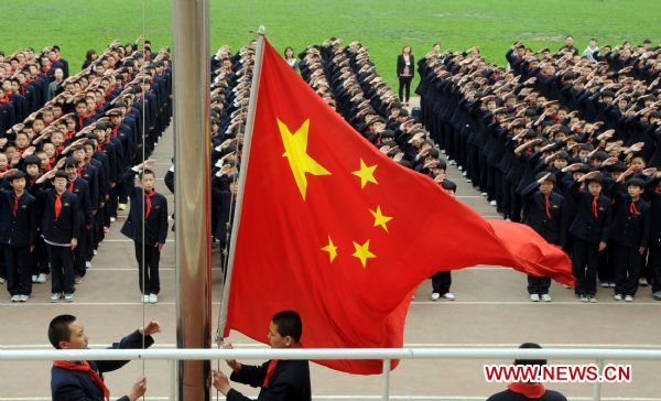 Students from Shijiazhuang Foreign Language School attend the national flag raising ceremony to celebrate the Chinese Youth Day in Shijiazhuang, central China's Hebei Province, May 4, 2011. The Chinese Youth Day commemorates the May 4th Movement that happened on May 4th, 1919, which ushered in the new democratic revolution in China.   (Xinhua/Gong Zhihong) (yyq) 