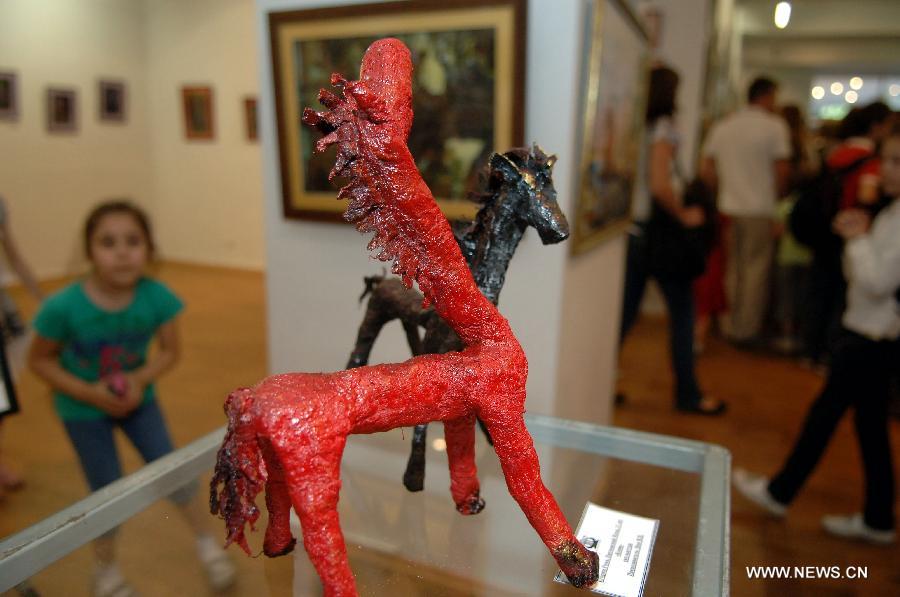 An artwork is displayed during an exhibition featuring more than 200 artworks by students from an art school in Almaty, Kazakhastan, May 15, 2012.