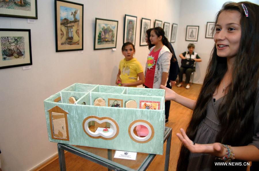 An artwork is displayed during an exhibition featuring more than 200 artworks by students from an art school in Almaty, Kazakhastan, May 15, 2012.