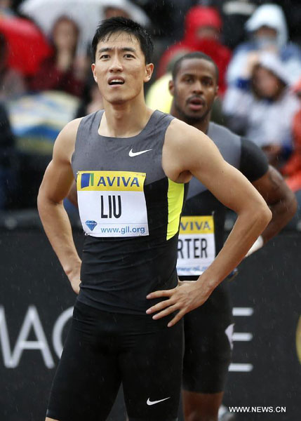 China's Liu Xiang views the score board after competing during the heats of men's 110m hurdle during the star-studded Aviva London Grand Prix at the Crystal Palace in London, the United Kingdom, July 13, 2012. (Xinhua/Wang Lili)