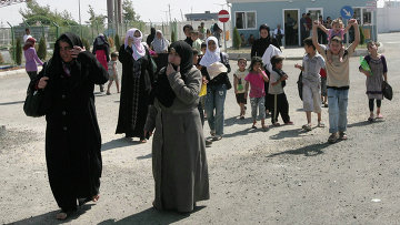 Беженцы в лагере сирийских беженцев в турецком городе Килис