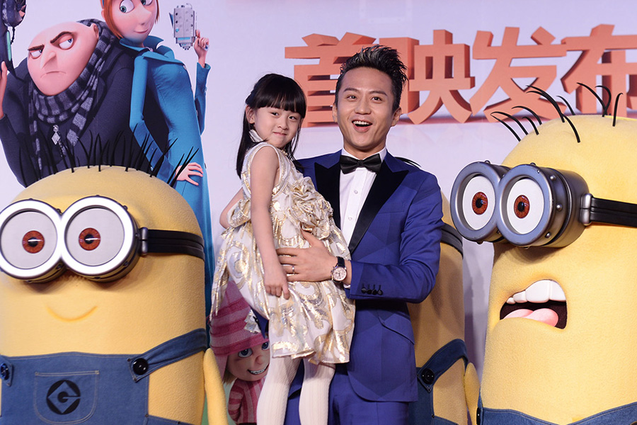 Chinese actor Deng Chao (R) and...
