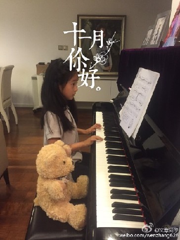 文章晒女儿弹琴照 自称首次对女儿发脾气(图)